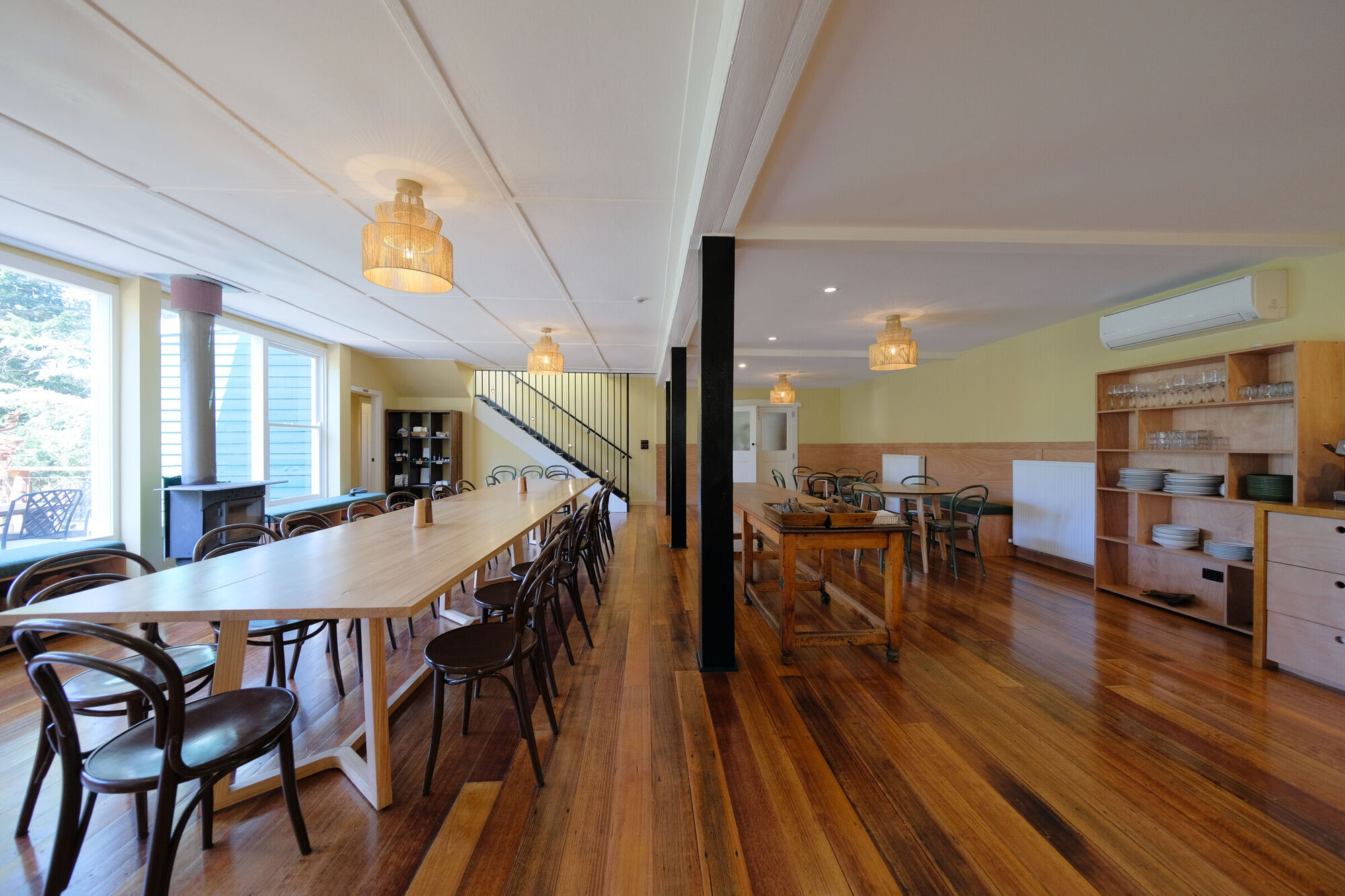 Long timber tables in the dining room