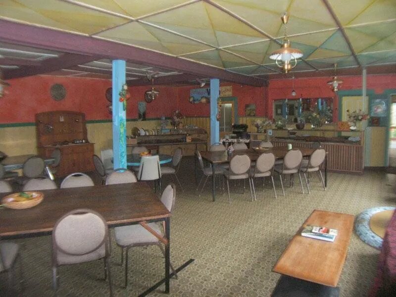 The dining room with painted walls and long tables