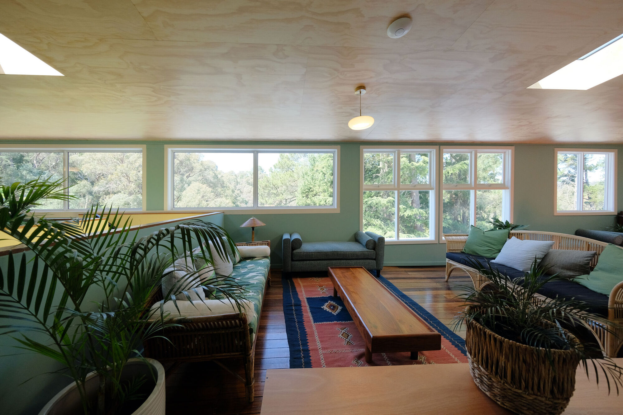 The Veranda Lounge with skylights, cane chairs and garden views